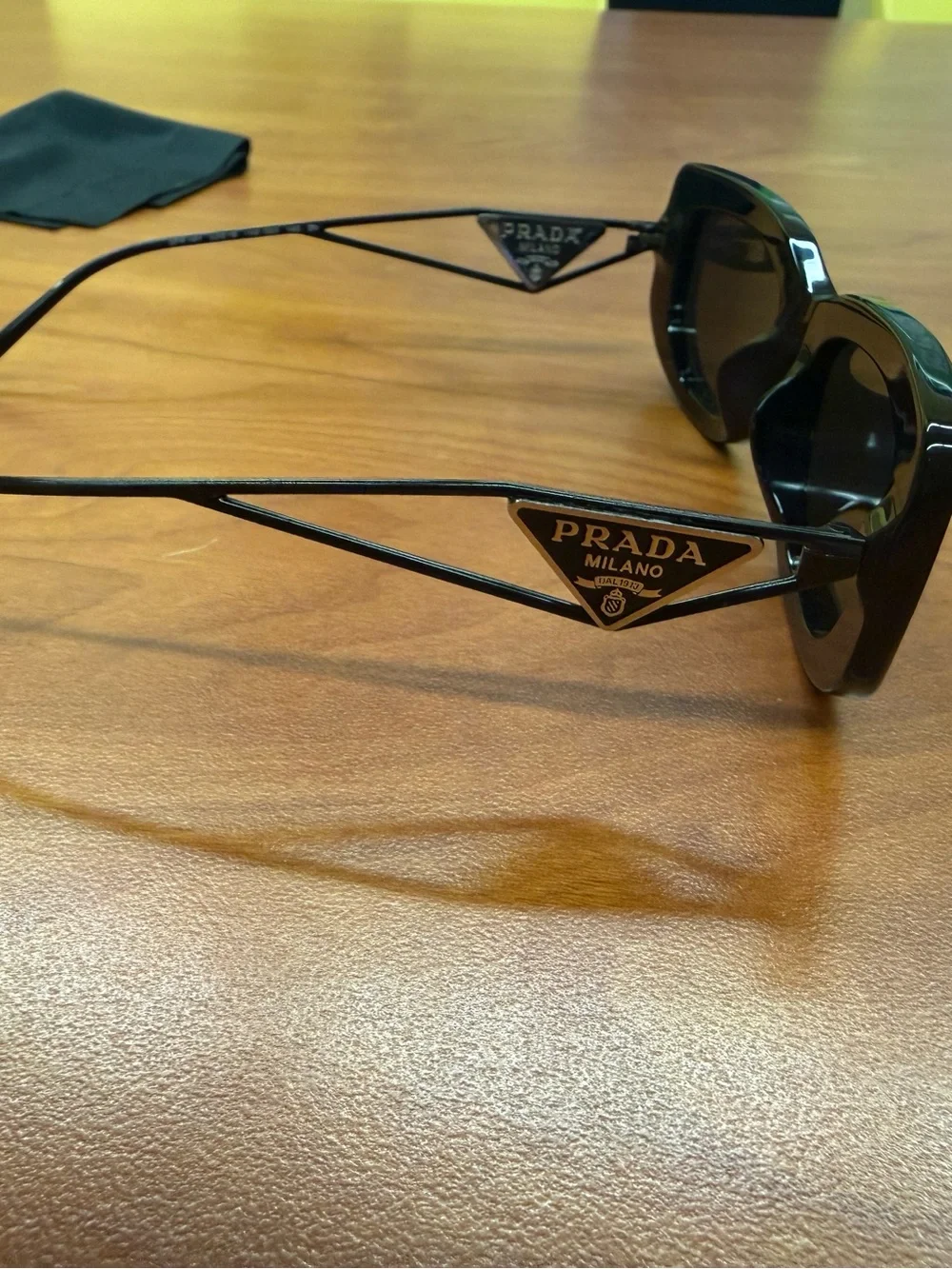 Prada Black Cat-Eye Sunglasses with Logo Temple Accent